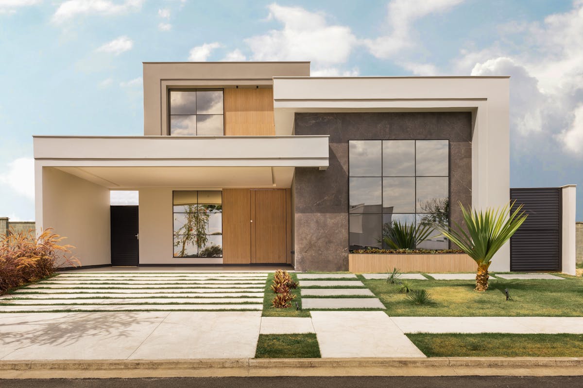 A modern home exterior with clean lines and manicured landscaping